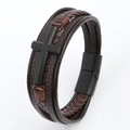 Detail view of a men's layered leather bracelet with a matte black metal cross charm - Black and Coffee