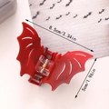 Red-brown bat-shaped hair claw clip with glossy finish and metal spring, 8.5cm width - Solid Red
