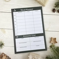 A5 weekly meal planner and grocery list notepad with dark green header on wooden surface - Weekly Meal Plan - Style A