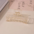 Transparent rectangular matte hair claw clip with golden metal spring on beige surface - #47 Clear Champagne - 10.5cm / Bulk (No Packaging)