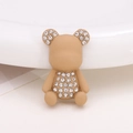 Close-up of a beige cartoon bear charm with sparkling rhinestones for shoes or DIY crafts - Khaki Painted Bear