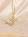 Macro shot of gold cross pendant with white zircon pavé on beige stone and silk - Gold / Classic White Zircon Cross