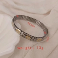 Silver stainless steel elastic bracelet with gold heart charm 60mm inner diameter - J002-2 Silver Gold 3D Heart