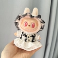 Pink rabbit plush doll wearing a black and white checkered dress with pearl details - White Fragrance Pendant Hairband / First And Second Generation Keychains Are Compatible With La Cloth Dolls. Dolls Not Included.