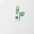 Creative Mahjong keychain featuring green Fa tile and dice with a durable D-ring clip - Green Facai