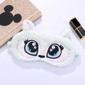 Detail of plush sleep mask with large cartoon eyes and star embroidery on white backdrop - Green Fox