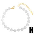 Minimalistisches Smiley-Gliederarmband mit silbernen Scheiben und goldenem Verschluss - Weiß