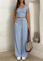 Détail de l'ensemble deux pièces bleu clair en tissu côtelé avec pantalon large à cordon - S / Haut Et Bas / Rose bonbon