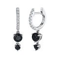 Detailed macro view showing the 14K stamp and pave-set zircons on silver hoop earrings - Black Silver