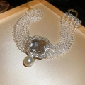 Detail of multi-layer crystal bead necklace with a square diamond pendant and pearl - Clear White Crystal Style (Necklace-Gold-White)