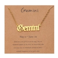 Detail of Gemini zodiac necklace in gold finish on a decorative kraft paper card - Gold-Gemini