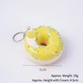 Porte-clés donut en mousse PU 7cm avec glaçage jaune et pépites colorées - Jaune