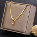 Detail of pink rectangular crystal pendant on gold snake chain jewelry set - Pink Rhinestone Necklace (26A06007)