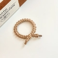 Elastic coffee-colored wavy hair band with stylish cylindrical ends for kids - Light Coffee