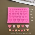 Stampo in silicone rosa con cuori di varie dimensioni per decorazioni di torte e dolci - Stampo Bordo Cuore