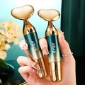 Electric facial massager in gold and gradient teal finish for skin lifting and firming - Heart Shape Importer / Blue Green Gradient