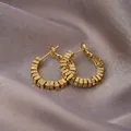 Minimalist gold geometric hoop earrings with textured square link design on grey silk - Geometric Industrial Style / E-058---Gold