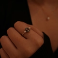 Vintage gold butterfly ring with black agate, small pearls and ruby red accents - Black Agate Starburst