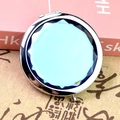 Portable silver metal folding makeup mirror with light blue faceted crystal top - Crystal Light Blue