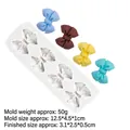 Moule en silicone blanc avec nœuds et exemples de nœuds en résine colorée - Modèle 3 / Gris