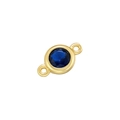 Macro detail of a round gold connector with a faceted blue stone for DIY jewelry making - Blue