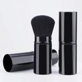 Portable retractable makeup brush in black metallic finish for travel and daily touch-ups - Large Black with Black Bristles