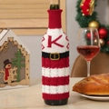 Knitted Christmas wine bottle cover with red stripes, Santa belt and letter K - Letter K