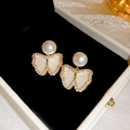 Detailed view of gold butterfly stud earrings with small pearls and crystals inlay - 19# Silver Needle - Gold Rhinestone Butterfly (HE21231)