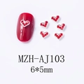Macro view of red heart nail art charms with silver base and 6x5mm size details - Red Glitter Heart (AJ103)