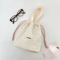 Cream polka dot drawstring handbag with pink cords and minimalist Japanese design - White