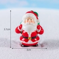 Miniature Santa Claus figurine with green gift bag, size 3.7cm height and 3cm width - No.5 Santa Claus with Green Gift Bag