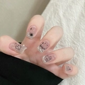 Close-up of cat-eye press-on nails featuring silver glitter, pearls, and hand-drawn puppy art - By1561 Clumsy Cotton Sheep / Glue Type