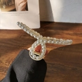 Matte haarklem met witte parels en gouden veer voor dik haar in beige kleur - Kruis Parel (Transparant)