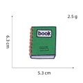 Green notebook embroidered patch with book text measuring 6.3 cm x 5.3 cm on white background - Book