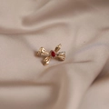 Elegant gold bow brooch with a central red gemstone and sparkling white crystals - 522# Bow