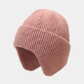 Detail of pink knitted earflap hat showing thick textured yarn and warm thermal ear protection - One Size / Dusty Pink
