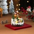 Leuchtendes Lebkuchenhaus aus Kunstharz mit rotierendem Zug Weihnachtsdekoration - Einzelnes Dachmodell