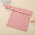 Pink quilted cotton diaper bag featuring white snap buttons and a convenient carry handle - Dusty Pink