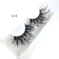 Macro shot of 25mm 3D false eyelashes with colorful glitter and sequins for stage makeup - K-02 [Glowing]