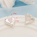 Vista macro dei ciondoli a cuore da 16mm con cristallo rosa e finitura argento per fai da te - Cuore Argentato (16mm*17mm)