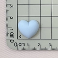 Detailed size measurement of light blue matte resin heart charm against a centimeter ruler - Lake Blue
