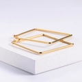 Minimalist square golden stainless steel hoop earrings with polished metallic finish - Gold