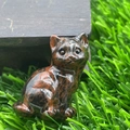 Polished 1.2 inch natural stone cat figurine with brown and black marble patterns - Mahogany Obsidian