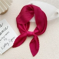 Elegant rose red pleated silk scarf with fine texture displayed in a stylish setting - Rose Red
