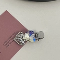 Macro shot of silver alloy hair clips with heart-shaped rhinestones and crystal detail - Silver/White Zirconia-Two Hearts