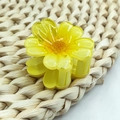 Translucent yellow glitter flower hair claw clip with detailed stamen and resin petals - Yellow Sunflower