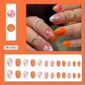 Faux ongles courts orange avec motifs de marguerites blanches et paillettes dorées - Style Fleur d'Oranger Douce (avec Colle)