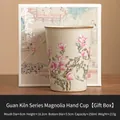 Light green Ru Kiln ceramic tea cup with pink magnolia pattern and matching gift box - Imperial Yellow Ru Kiln Magnolia Cup (Gift Box Set)
