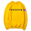 Unisex yellow crewneck sweatshirt with black Freedom print and flag patch - Yellow