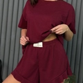 Women's burgundy ribbed knit two-piece set with round neck top and ruffle hem shorts - S / Burgundy